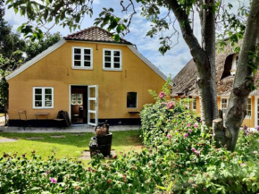 Den gamle skomager hytte ved slotssøen